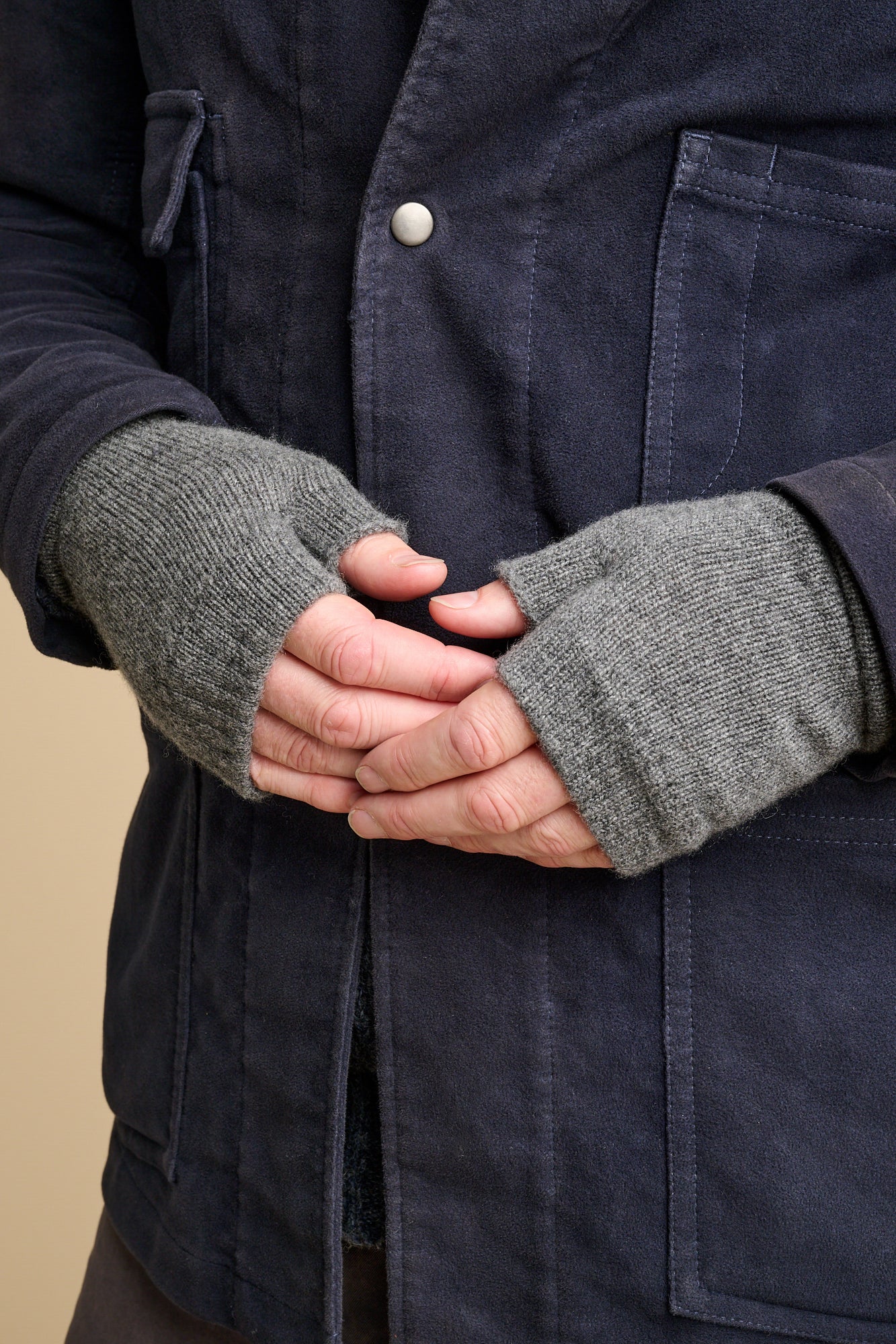 Male wearing cashmere fingerless gloves in charcoal