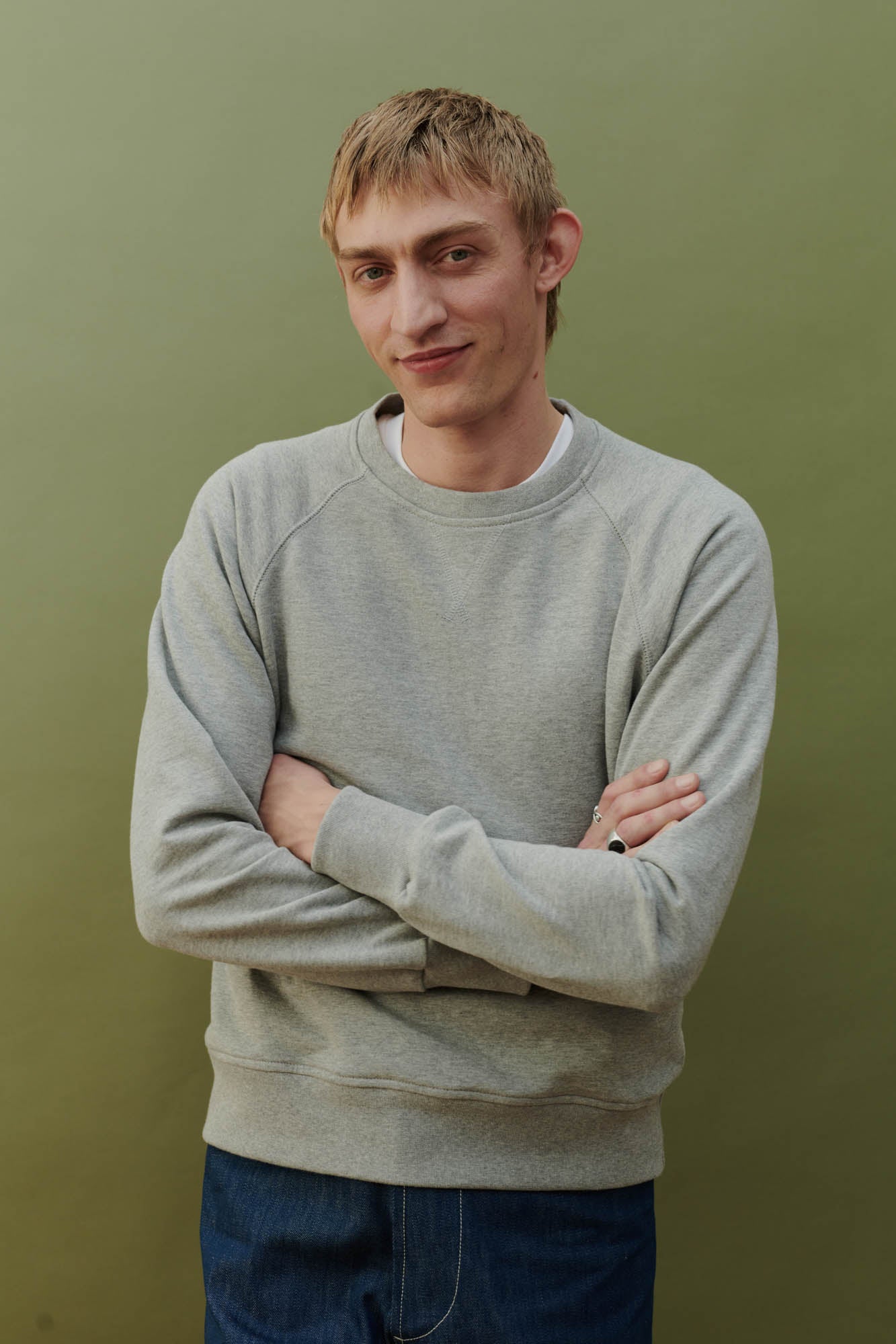Male in raglan sweatshirt grey