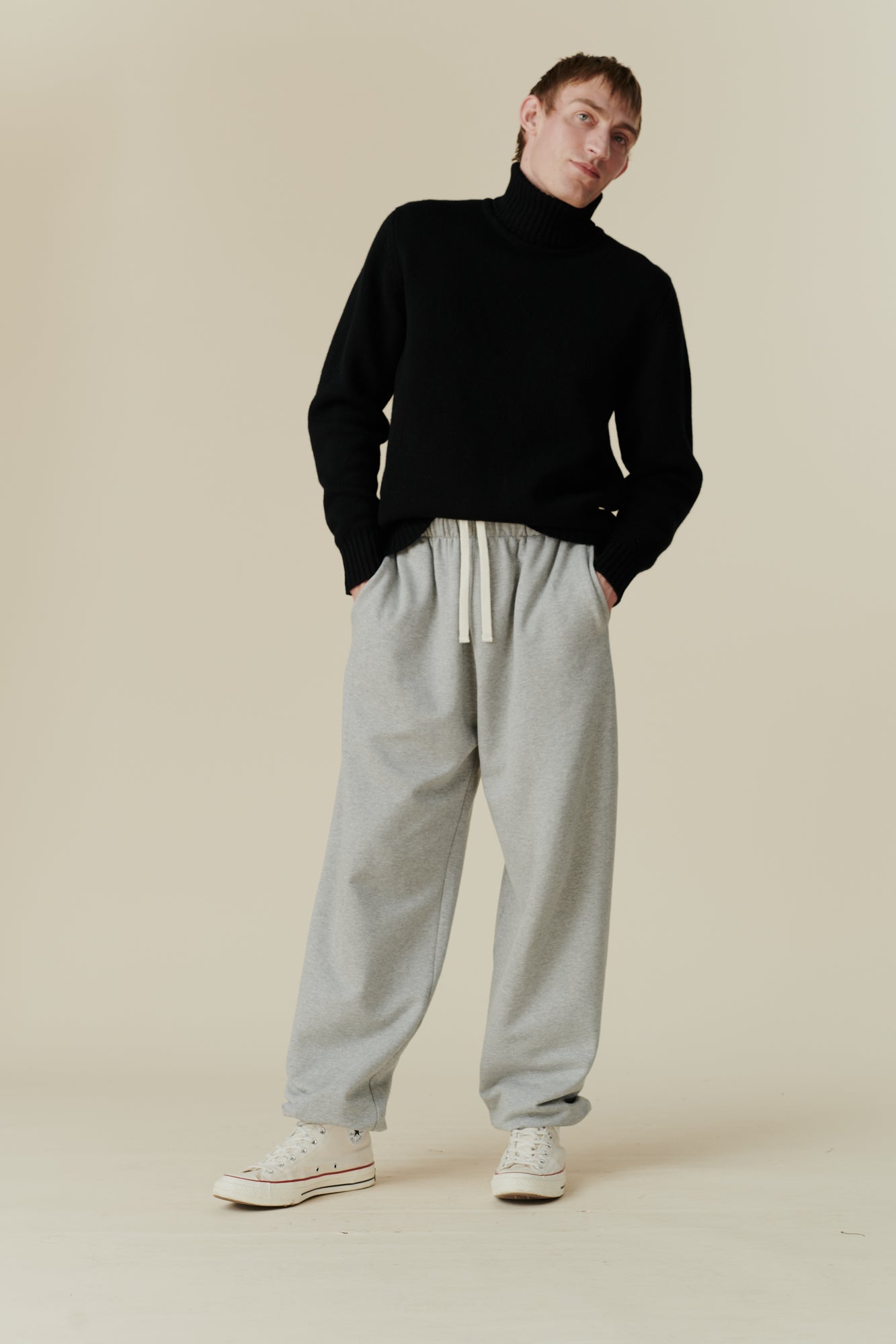 Male wearing sweatpants in grey marl