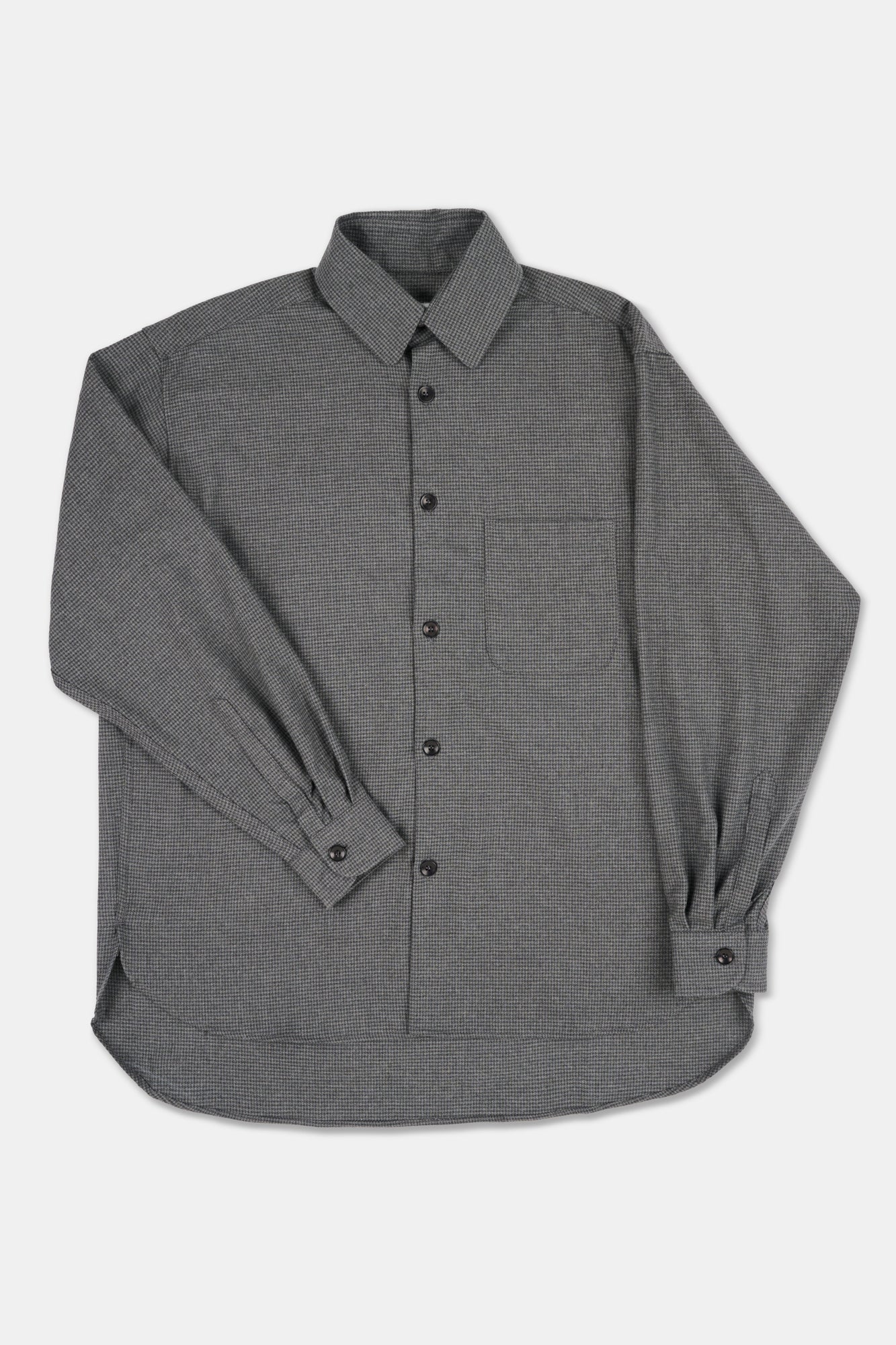 Grey shirt with long sleeves on a white background