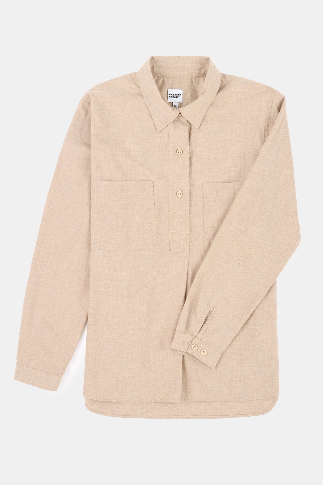 Beige shirt with long sleeves on a white background