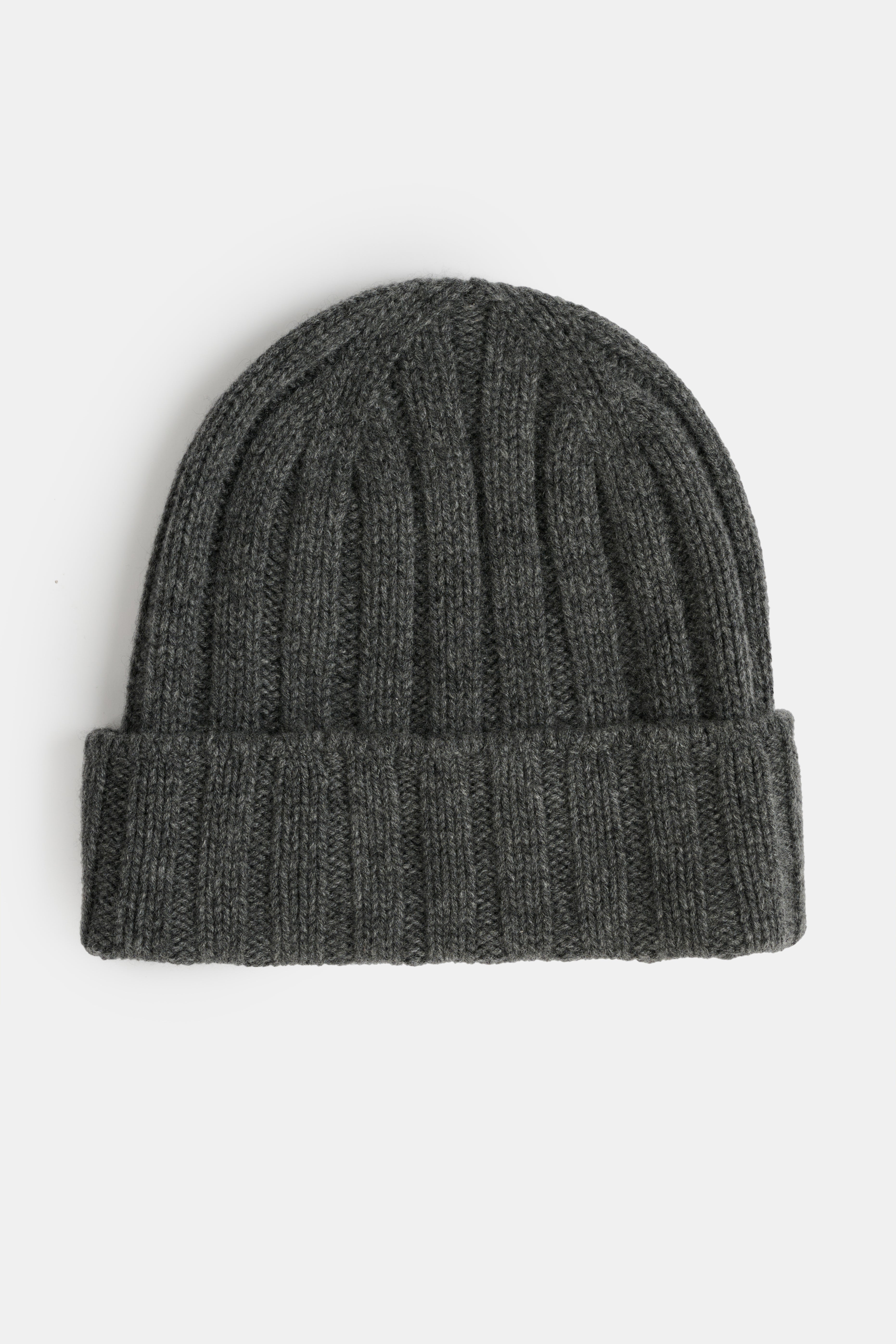 A dark grey ribbed knit beanie hat with a folded hem.