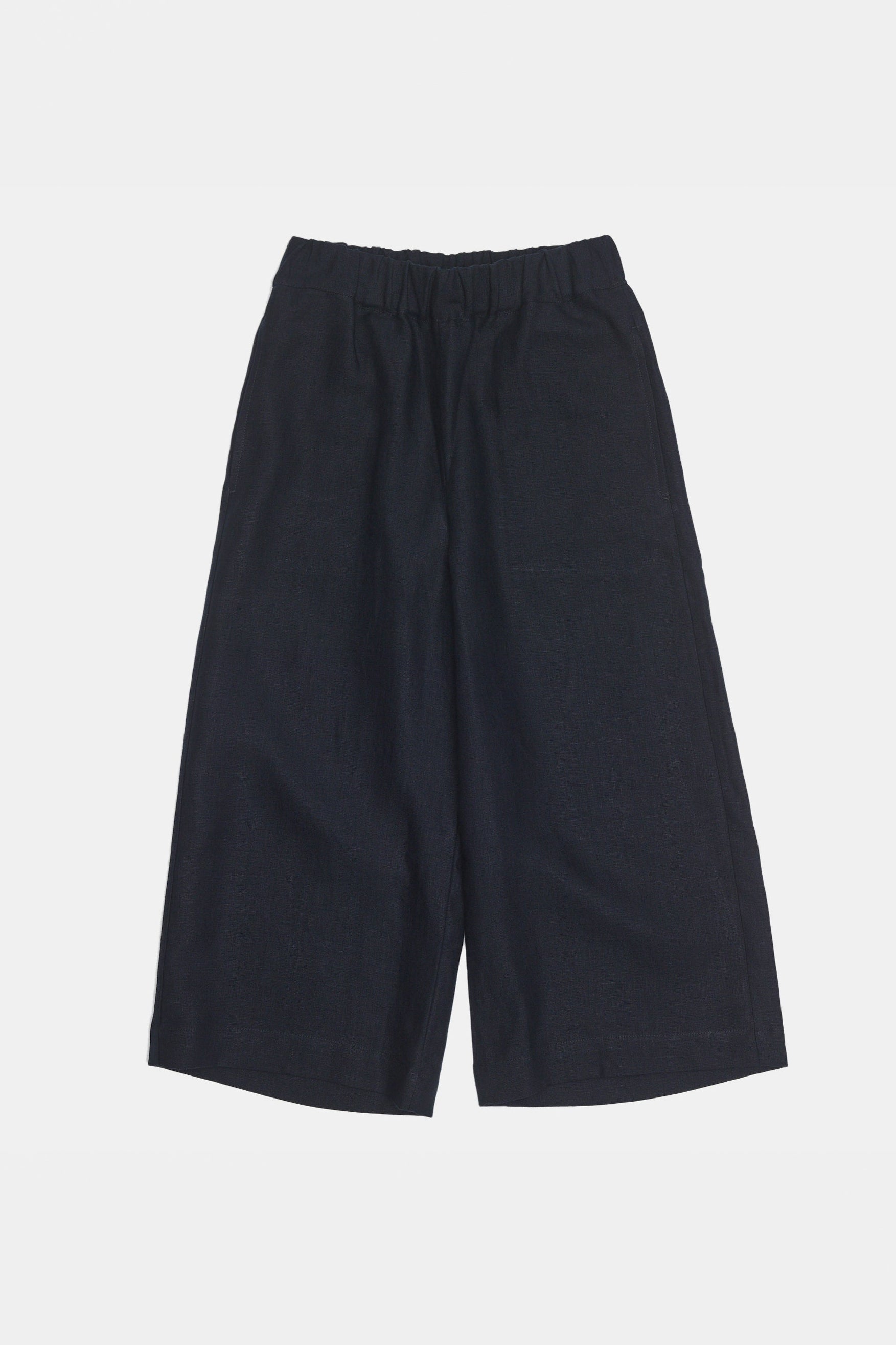 Overhead flat lay shot of short pj trousers in navy linen