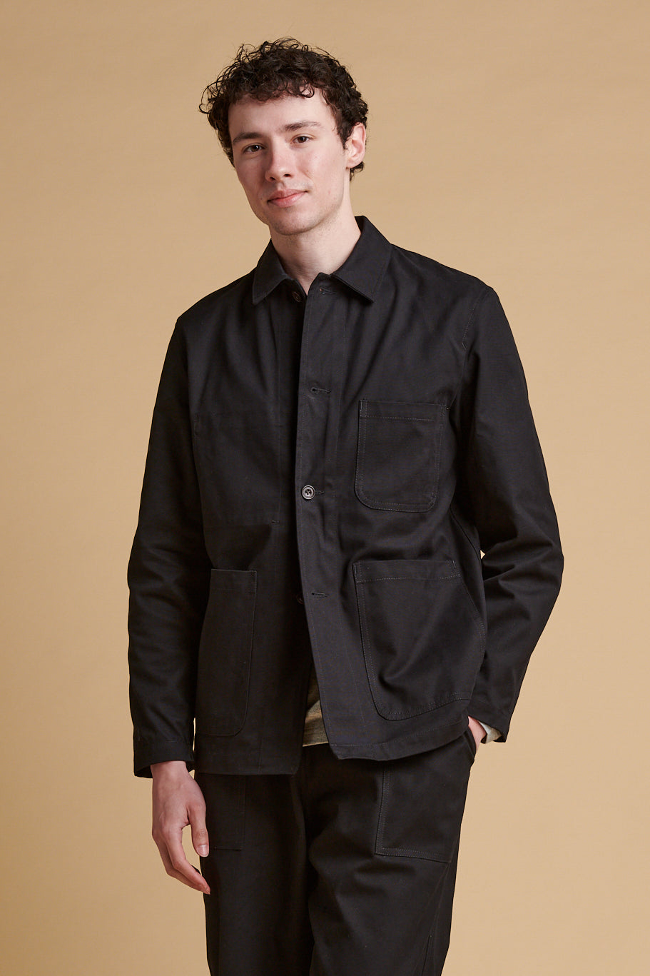 Male wearing chore jacket black
