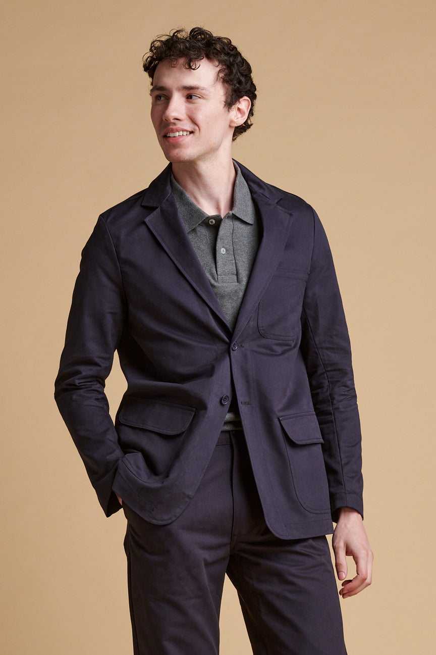 Male wearing dark navy James single breasted blazer.