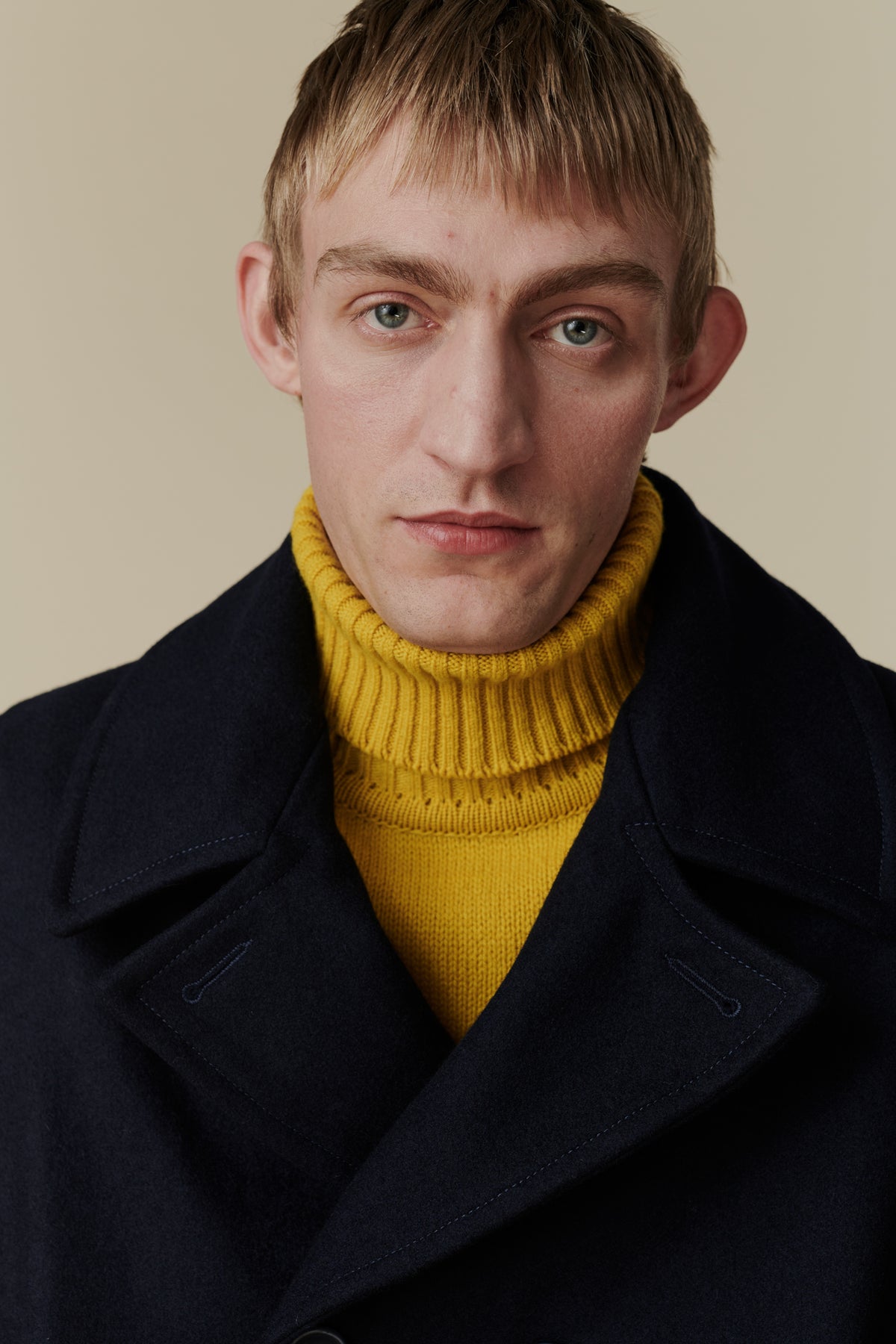 Portrait of wearing pea coat in navy 