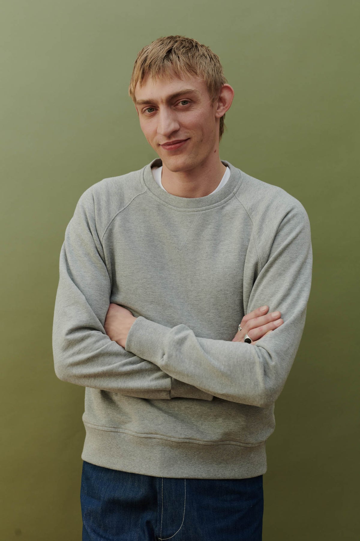 Male in raglan sweatshirt grey