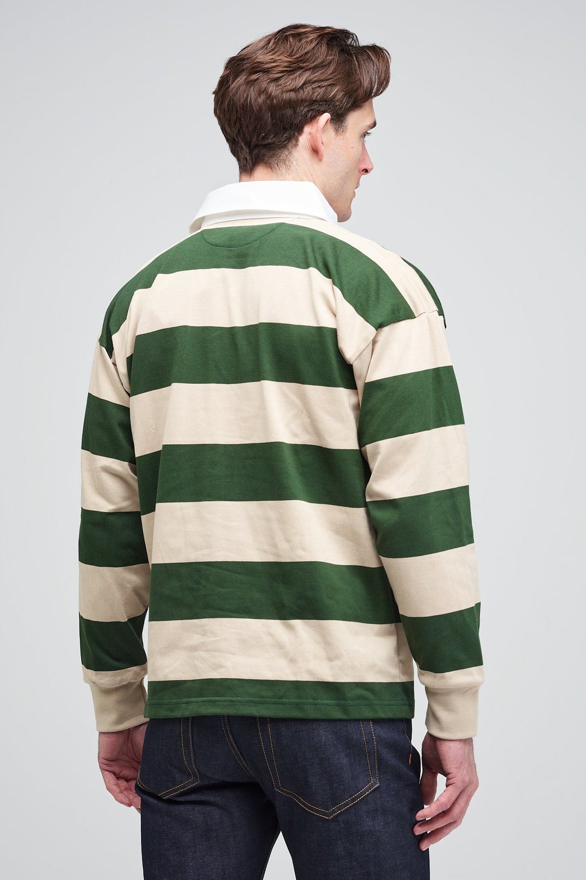 rear of white male in rugby shirt forest linen