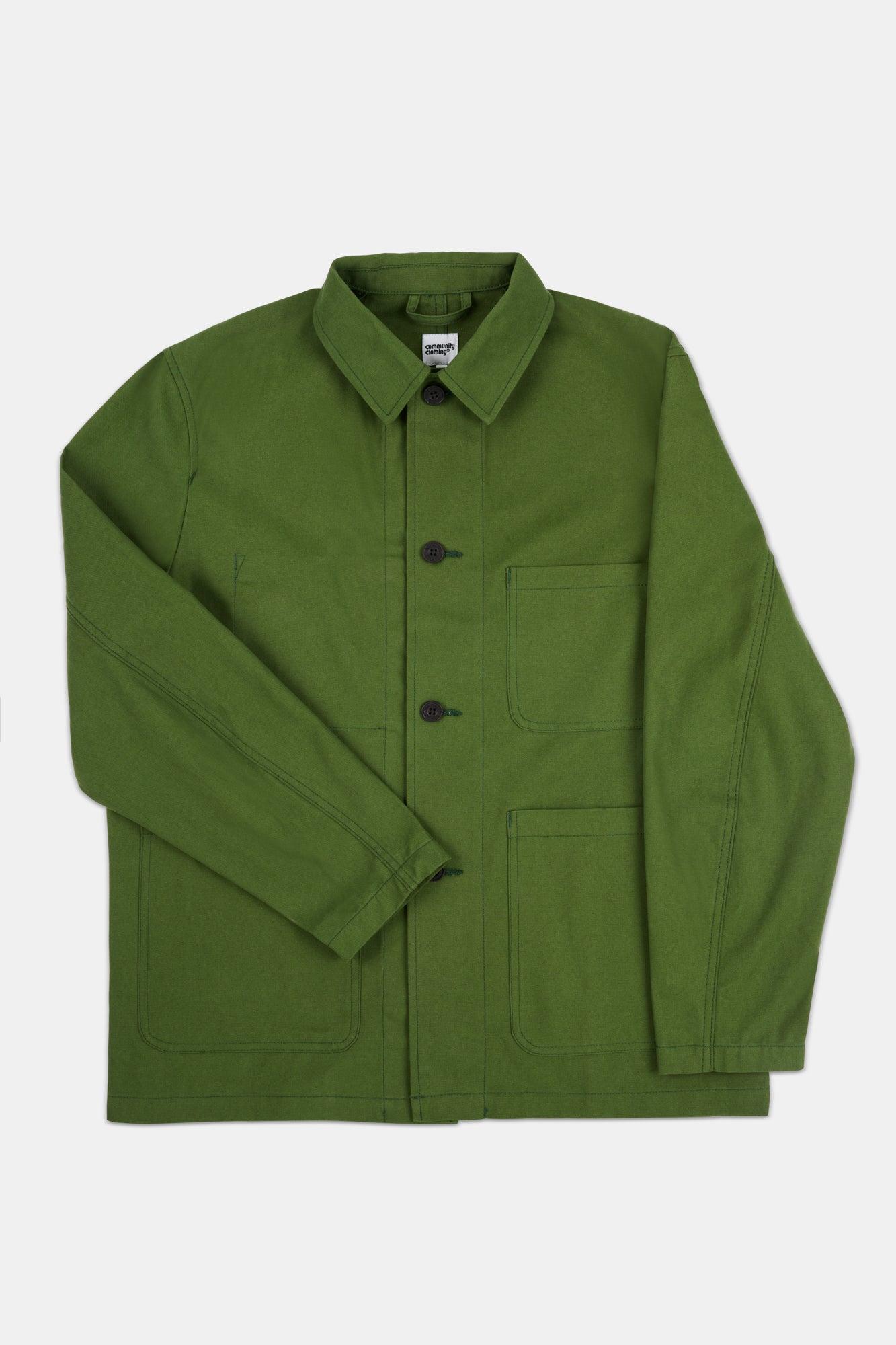 Green jacket with black buttons on a white background
