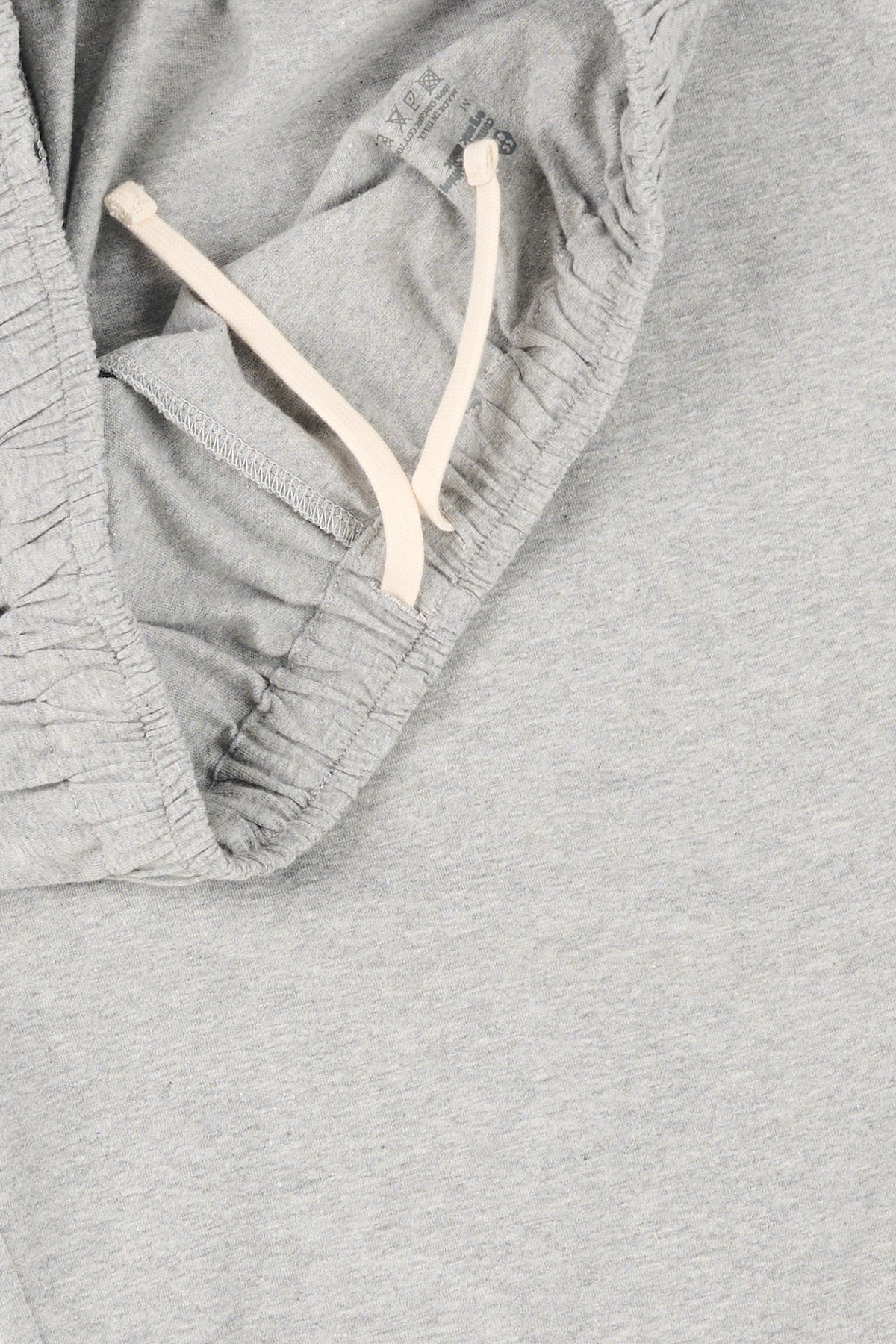 Close up of grey pyjamas with a drawstring