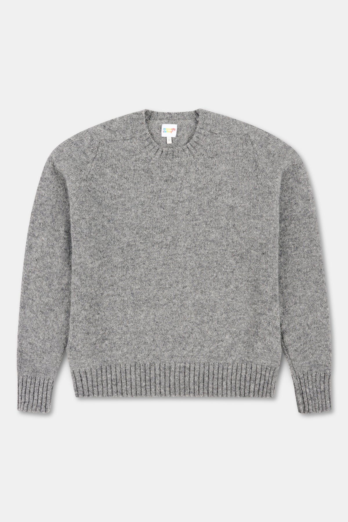 Grey marl knit jumper on white background.
